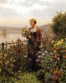 Frau in einem Garten Landfrau Daniel Ridgway Ritter Blumen